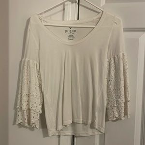 Eyelet bell sleeve top
